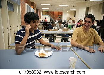 Stock Photo - boys (16-17) sitting 
in canteen. fotosearch 
- search stock 
photos, pictures, 
images, and photo 
clipart