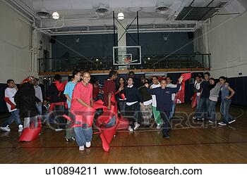 Stock Photography - children (11-13) 
and teenagers 
(15-17) standing 
in basketball 
court. fotosearch 
- search stock 
photos, pictures, 
images, and photo 
clipart