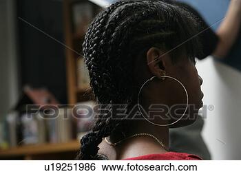 Stock Photo - girl (11-13) with 
braided hair, 
close-up. fotosearch 
- search stock 
photos, pictures, 
images, and photo 
clipart