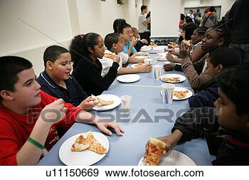 Stock Photograph - large group of 
children (10-13) 
eating pizzas 
in canteen. fotosearch 
- search stock 
photos, pictures, 
images, and photo 
clipart