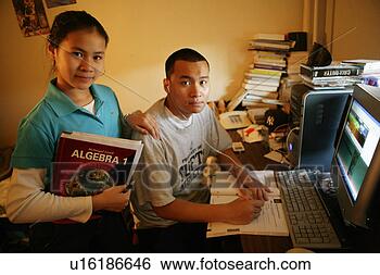 Stock Photo - teenagers (15-17) 
with books and 
computer, portrait. 
fotosearch - search 
stock photos, 
pictures, images, 
and photo clipart