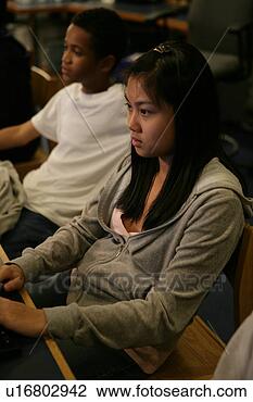 Stock Photo - teenagers (15-17) 
engrossed in work. 
fotosearch - search 
stock photos, 
pictures, images, 
and photo clipart