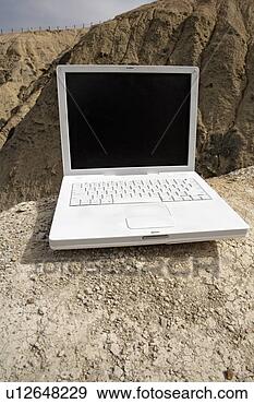 Stock Photograph - view of a laptop 
in remote area. 
fotosearch - search 
stock photos, 
pictures, images, 
and photo clipart