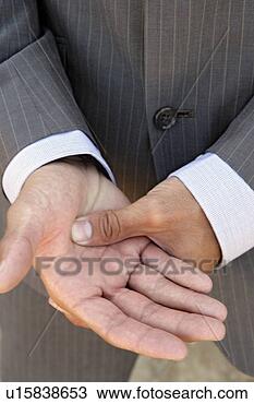Stock Photo - view of a mans 
hands. fotosearch 
- search stock 
photos, pictures, 
images, and photo 
clipart