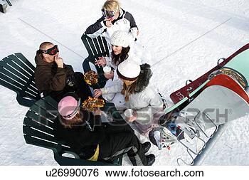 Stock Photo - group of friends 
enjoying hot drinkis. 
fotosearch - search 
stock photos, 
pictures, images, 
and photo clipart