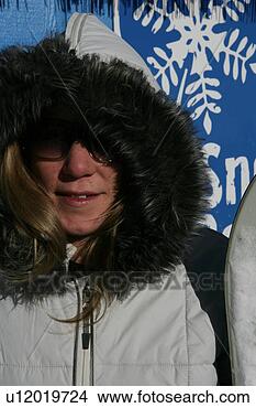 Stock Photo - hooded woman in 
shades. fotosearch 
- search stock 
photos, pictures, 
images, and photo 
clipart