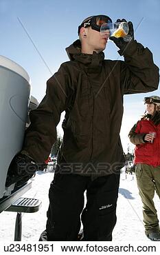Stock Photography - man drinking on 
a ski slope. fotosearch 
- search stock 
photos, pictures, 
images, and photo 
clipart