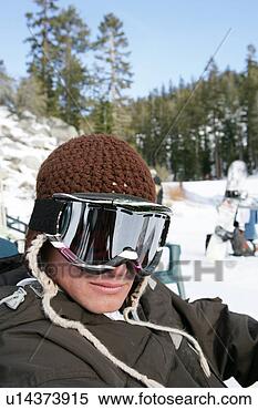 Stock Image - man posing wearing 
ski goggles. fotosearch 
- search stock 
photos, pictures, 
images, and photo 
clipart