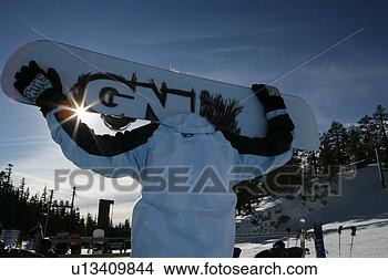 Stock Photo - person holding 
a snowboard. fotosearch 
- search stock 
photos, pictures, 
images, and photo 
clipart