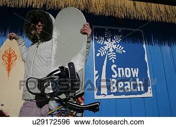 Stock Photo - woman holding 
snowboards. fotosearch 
- search stock 
photos, pictures, 
images, and photo 
clipart