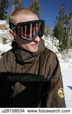 Stock Photo - young man wearing 
snow goggles. 
fotosearch - search 
stock photos, 
pictures, images, 
and photo clipart