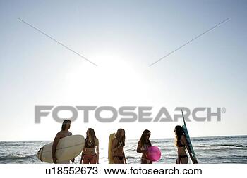 Stock Photo - view of five people 
on a beach. fotosearch 
- search stock 
photos, pictures, 
images, and photo 
clipart