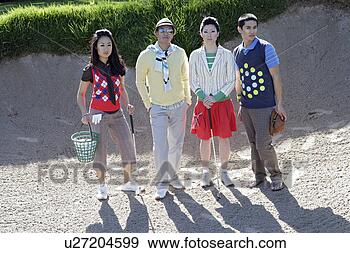 Stock Photograph - view of four people 
looking at camera. 
fotosearch - search 
stock photos, 
pictures, images, 
and photo clipart