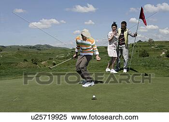 Stock Image - view of people 
rejoicing on a 
golf course. fotosearch 
- search stock 
photos, pictures, 
images, and photo 
clipart