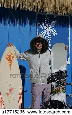 Stock Image - women posing with 
snowboards. fotosearch 
- search stock 
photos, pictures, 
images, and photo 
clipart