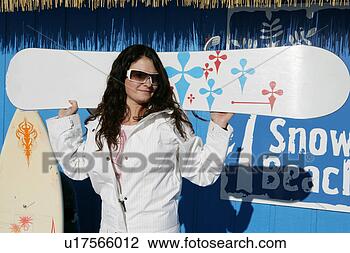 Stock Photo - young woman holding 
a snow board. 
fotosearch - search 
stock photos, 
pictures, images, 
and photo clipart