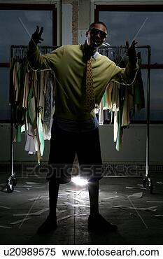 Stock Image - young man standing 
up, gesturing. 
fotosearch - search 
stock photos, 
pictures, images, 
and photo clipart