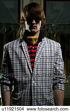 Stock Photo - young man wearing 
shades and a plaid 
jacket. fotosearch 
- search stock 
photos, pictures, 
images, and photo 
clipart
