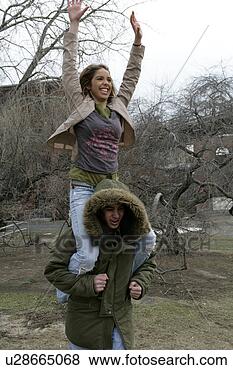 Stock Photo - view of a man 
carrying a woman. 
fotosearch - search 
stock photos, 
pictures, images, 
and photo clipart
