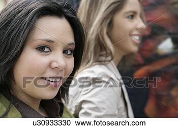 Stock Photography - view of two women 
looking at camera. 
fotosearch - search 
stock photos, 
pictures, images, 
and photo clipart