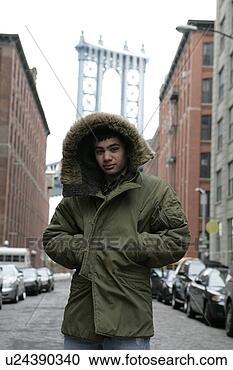 Stock Photography - view of a young 
man looking at 
camera. fotosearch 
- search stock 
photos, pictures, 
images, and photo 
clipart