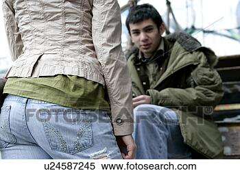 Stock Image - view of a young 
man looking at 
camera. fotosearch 
- search stock 
photos, pictures, 
images, and photo 
clipart