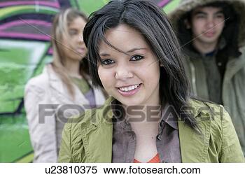 Stock Image - view of a young 
woman looking 
at camera. fotosearch 
- search stock 
photos, pictures, 
images, and photo 
clipart