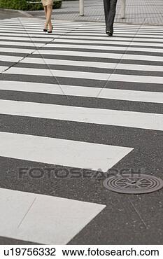 Stock Photo - low section of 
two young businesswomen 
walking. fotosearch 
- search stock 
photos, pictures, 
images, and photo 
clipart