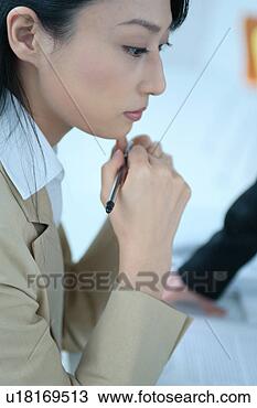 Stock Photo - one young woman 
pondering in office. 
fotosearch - search 
stock photos, 
pictures, images, 
and photo clipart