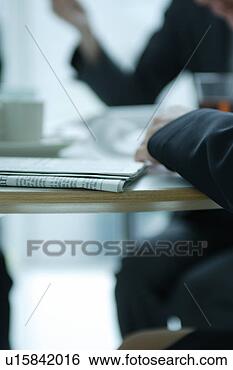 Stock Photo - small group of 
young women having 
meeting in office, 
 close-up. fotosearch 
- search stock 
photos, pictures, 
images, and photo 
clipart