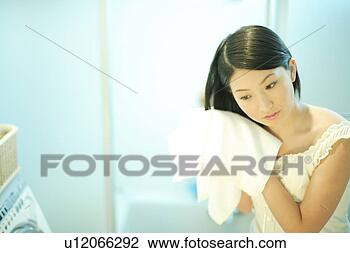Stock Photo - young woman drying 
hair with towel. 
fotosearch - search 
stock photos, 
pictures, images, 
and photo clipart
