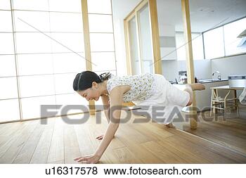 Stock Photo - young woman tripping 
over step. fotosearch 
- search stock 
photos, pictures, 
images, and photo 
clipart