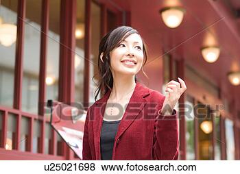 Stock Photo - a mid adult woman 
walking. fotosearch 
- search stock 
photos, pictures, 
images, and photo 
clipart