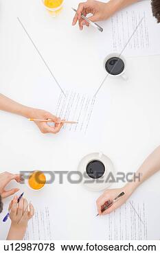 Stock Photo - hands of people 
meeting at desk. 
fotosearch - search 
stock photos, 
pictures, images, 
and photo clipart
