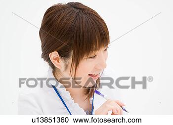 Stock Photography - a young woman 
talking. fotosearch 
- search stock 
photos, pictures, 
images, and photo 
clipart