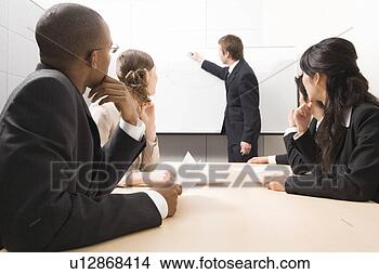 Stock Photo - business people 
having meeting. 
fotosearch - search 
stock photos, 
pictures, images, 
and photo clipart