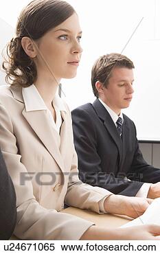 Stock Image - business people 
having meeting. 
fotosearch - search 
stock photos, 
pictures, images, 
and photo clipart