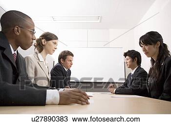 Stock Photo - business people 
having meeting. 
fotosearch - search 
stock photos, 
pictures, images, 
and photo clipart