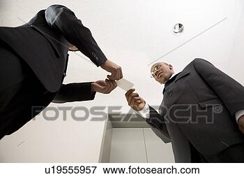 Picture - businessmen exchanging 
business cards. 
fotosearch - search 
stock photos, 
pictures, images, 
and photo clipart