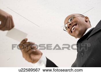Picture - businessmen exchanging 
business cards. 
fotosearch - search 
stock photos, 
pictures, images, 
and photo clipart