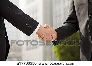 Stock Photography - businessmen shaking 
hands. fotosearch 
- search stock 
photos, pictures, 
images, and photo 
clipart