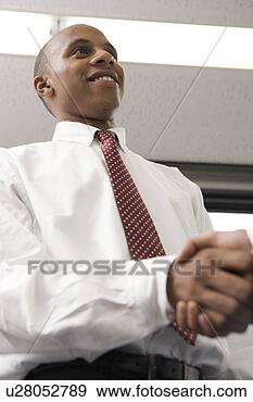 Stock Photograph - businessmen shaking 
hands. fotosearch 
- search stock 
photos, pictures, 
images, and photo 
clipart