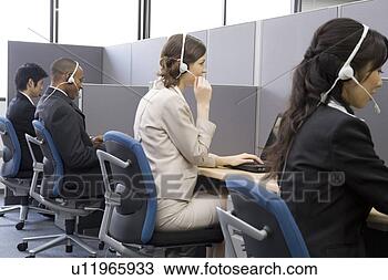 Stock Photo - young people working 
in call center. 
fotosearch - search 
stock photos, 
pictures, images, 
and photo clipart