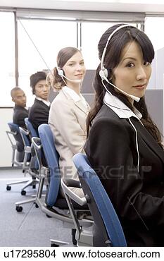 Stock Photo - young people working 
in call center. 
fotosearch - search 
stock photos, 
pictures, images, 
and photo clipart
