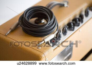 Stock Photograph - amplifier and 
cable. fotosearch 
- search stock 
photos, pictures, 
images, and photo 
clipart