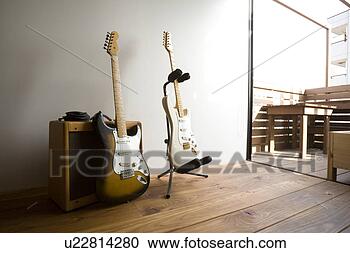 Stock Photography - electric guitars 
and amplifier. 
fotosearch - search 
stock photos, 
pictures, images, 
and photo clipart