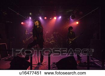 Stock Photography - rock band in concert. 
fotosearch - search 
stock photos, 
pictures, images, 
and photo clipart