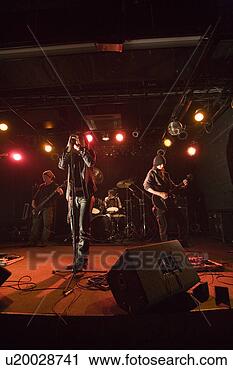Stock Photography - rock band in concert. 
fotosearch - search 
stock photos, 
pictures, images, 
and photo clipart