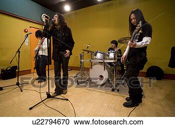 Stock Photography - rock band in rehearsal. 
fotosearch - search 
stock photos, 
pictures, images, 
and photo clipart