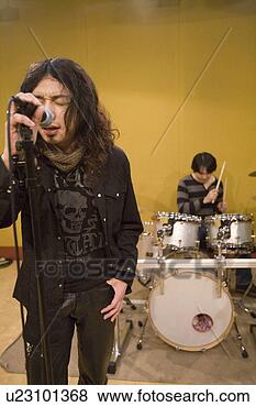 Stock Photo - rock band in rehearsal. 
fotosearch - search 
stock photos, 
pictures, images, 
and photo clipart